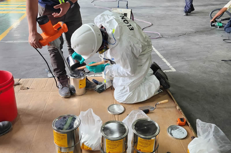 Aplicación de productos químicos para construcción